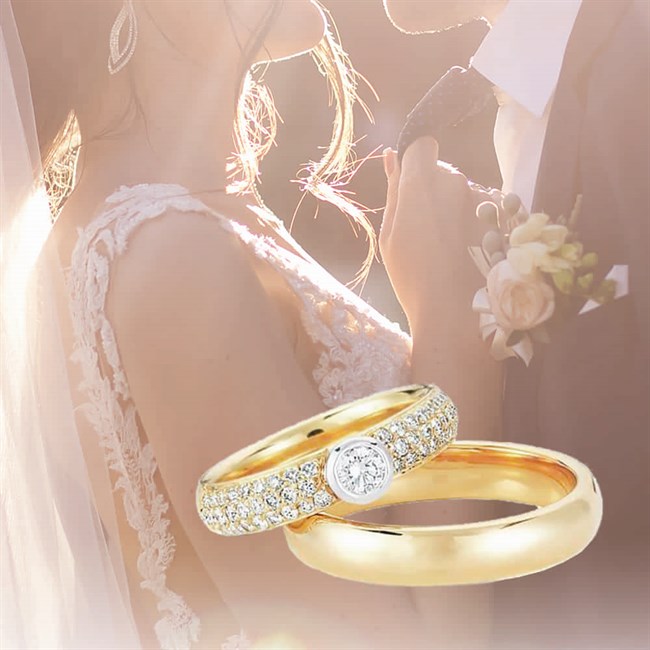 Zwei farbige Trauring in 14 kt. Gold und Weißgold