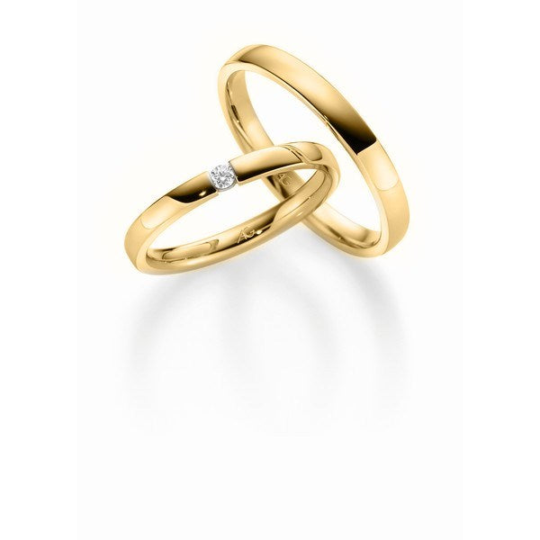Gerstner vielsesringe i guld med én diamant og blank overflade