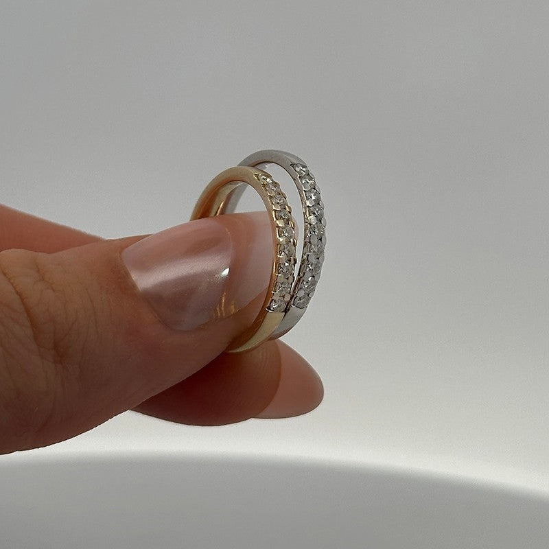 Alliancering i 14 kt guld med 9 brillanter på i alt 0,20 ct.