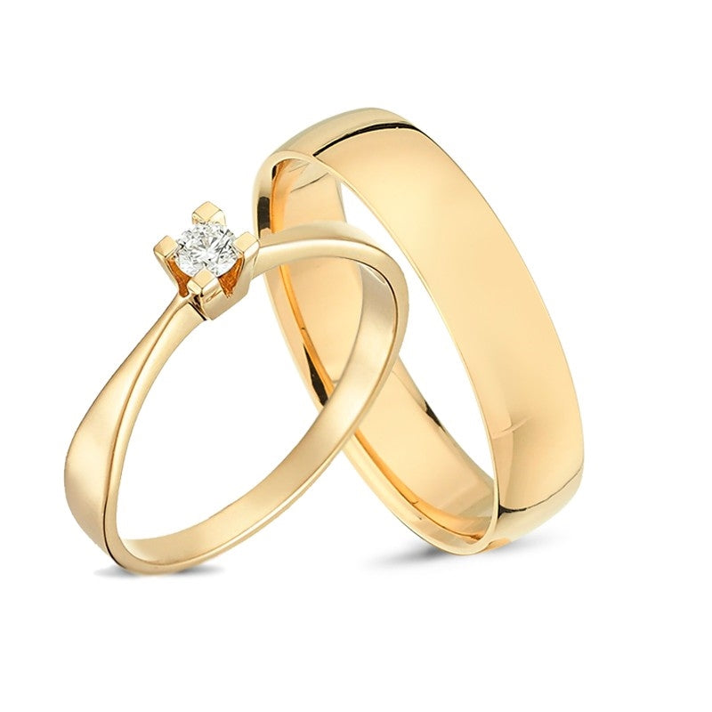 Vielsesringe i 14 kt guld fra Nuran med 0,10 ct brillant