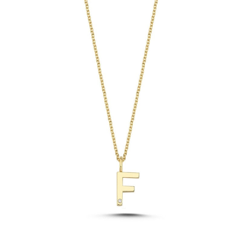 Buchstabenanhänger in 14 kt Gold mit 0,005 ct. 9,5 mm