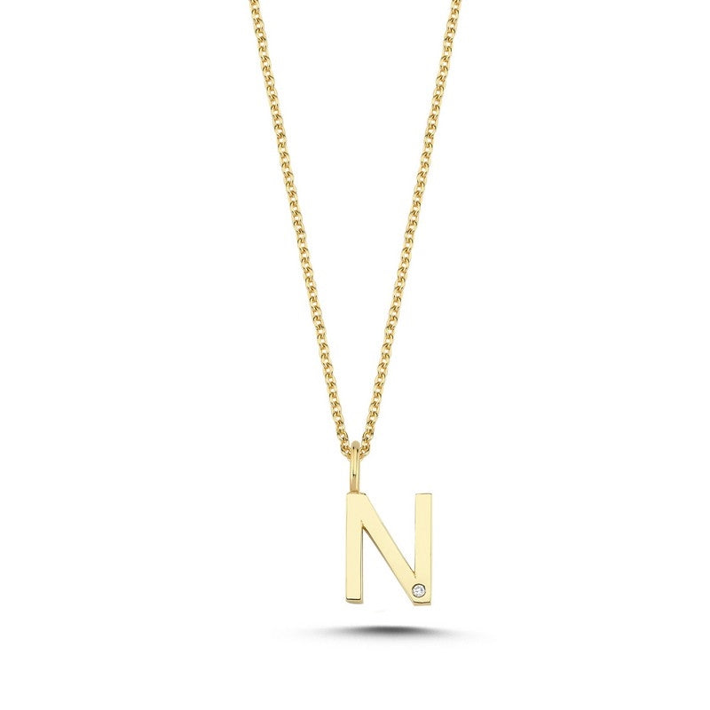 Buchstabenanhänger in 14 kt Gold mit 0,005 ct. 9,5 mm