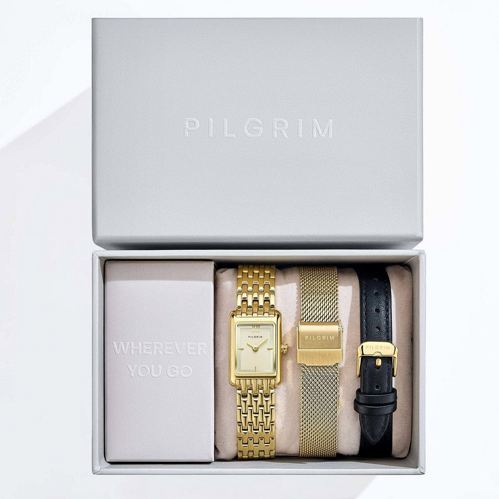 Elegantes Pilgrim-Geschenkset mit rechteckiger, goldfarbener 19,5-mm-Uhr und passendem Armband aus goldfarbenem Edelstahl in einer stilvollen Geschenkbox
