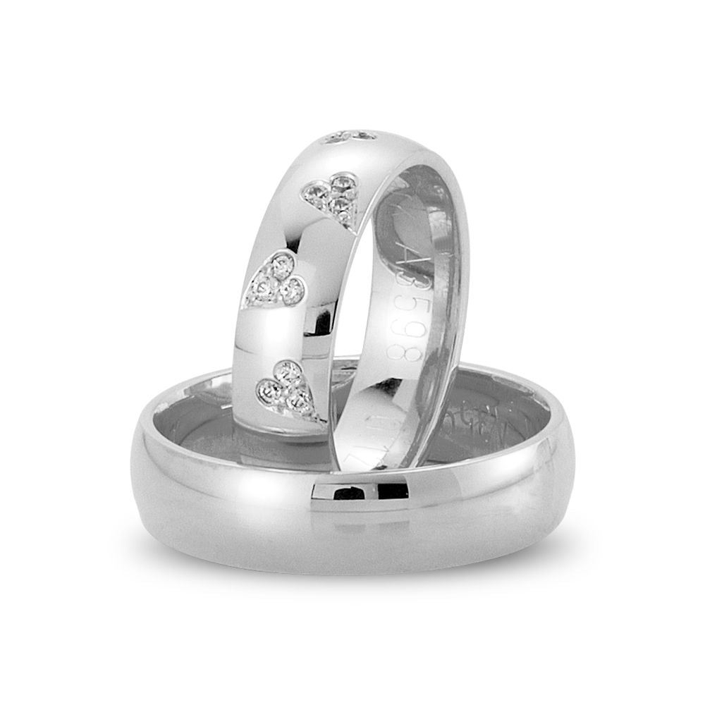 Nuran vielsesringe i 14 kt hvidguld med diamantbesatte hjerter og 0,12 ct brillanter