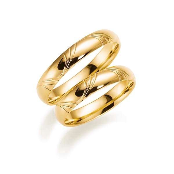 Aagaard vielsesringe i 14 karat guld med mønster, 4 mm bredde