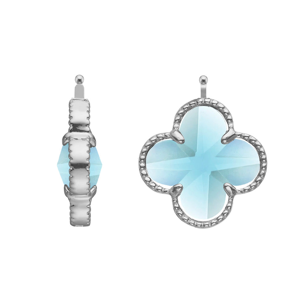 Elegante Heide Heinzendorff Kleeblatt-Ohrringe aus rhodiniertem Silber mit hellblauen, facettierten Glassteinen – stilvoll präsentiert vom Schmuckzentrum.
