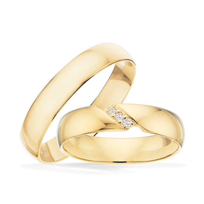 Trauringe in 8-14 kt Gold mit Brillanten diagonal gefasst, insgesamt 0,03 ct
