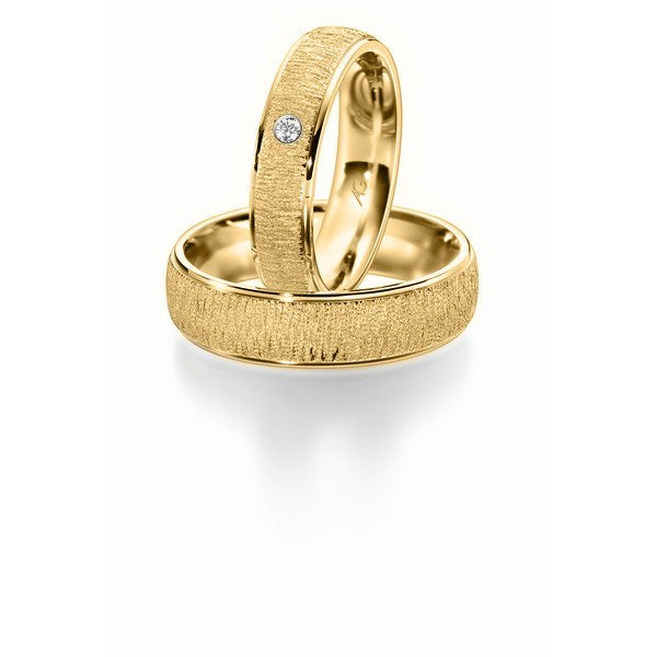 Massive Gerstner vielsesringe i guld med 0,03 ct. diamant og bredt design