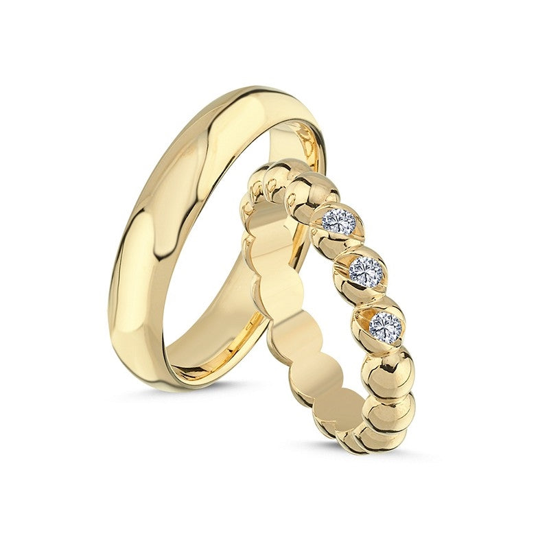 Vielsesringe fra Nuran i 14 kt guld – kuglering med brillanter og maskulin herremodel