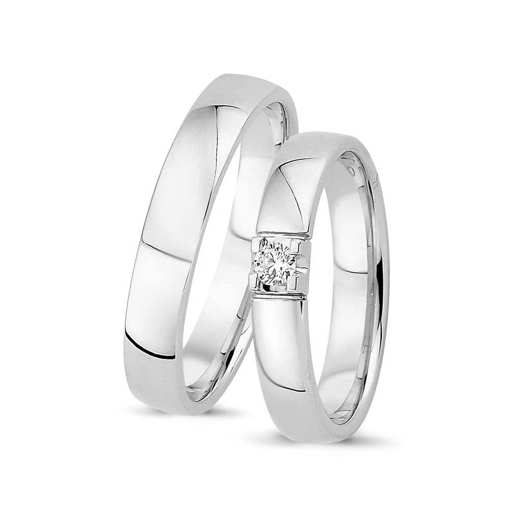 Vielsesringe i 14 kt hvidguld med 0,09 ct brillant og buet profil