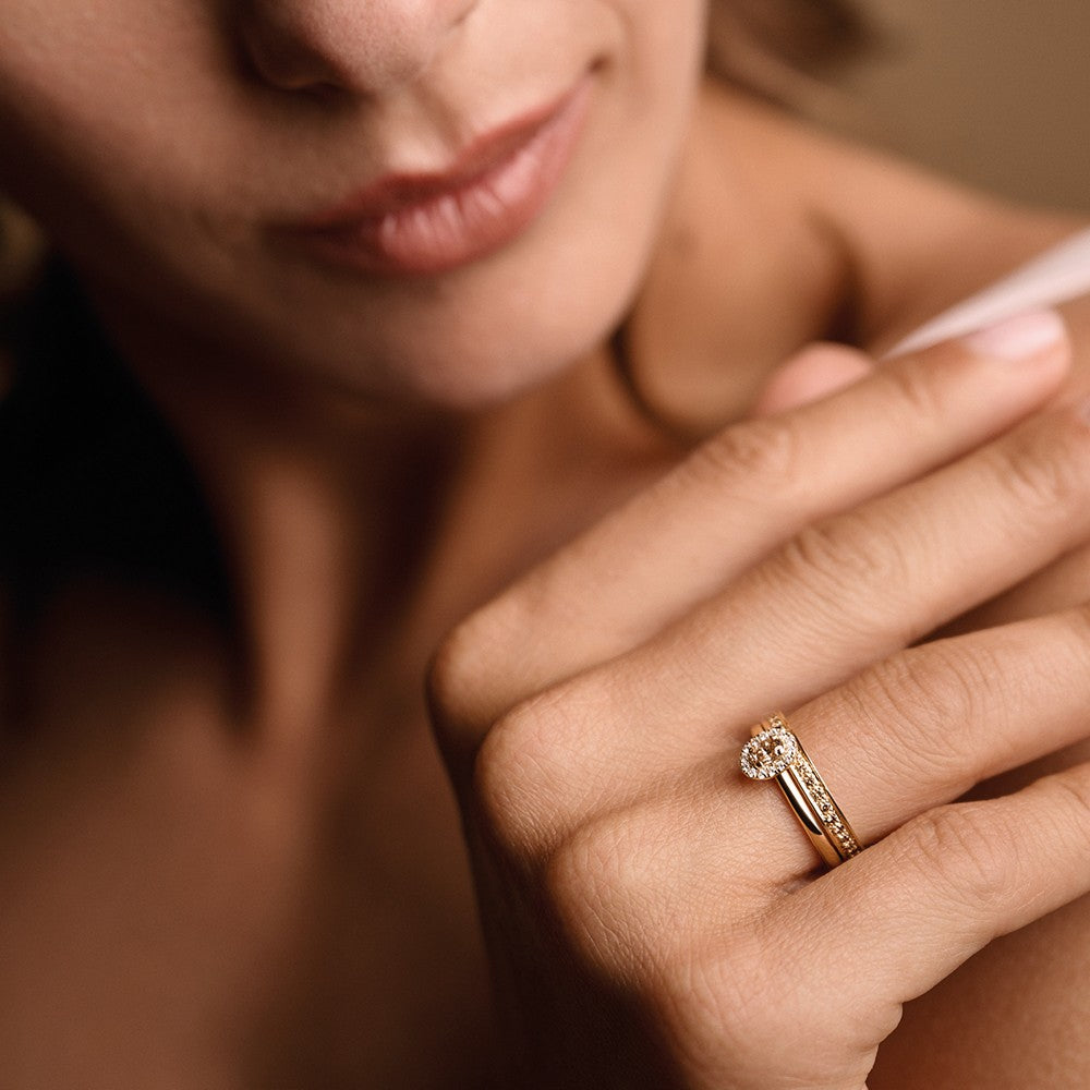 Nuran - Champagner-Ring in 14 kt Gold mit weißen Brillanten von insgesamt 0,24 ct