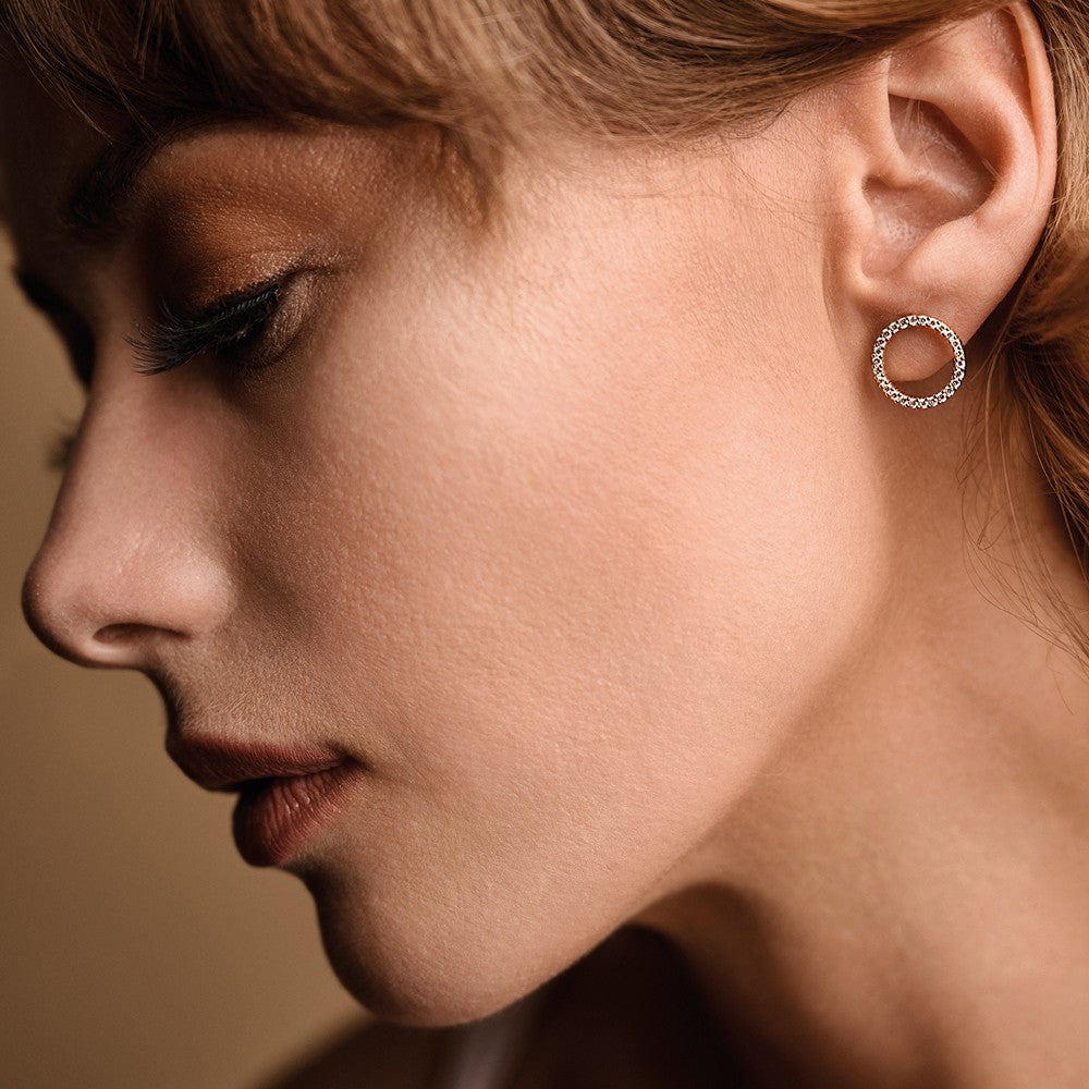Nuran - Kreis Diamantohrringe in 14 kt Gold mit insgesamt 0,54 ct.