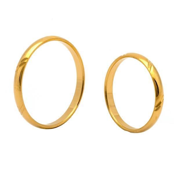 Scrouples vielsesringe i guld med mønster og blank overflade