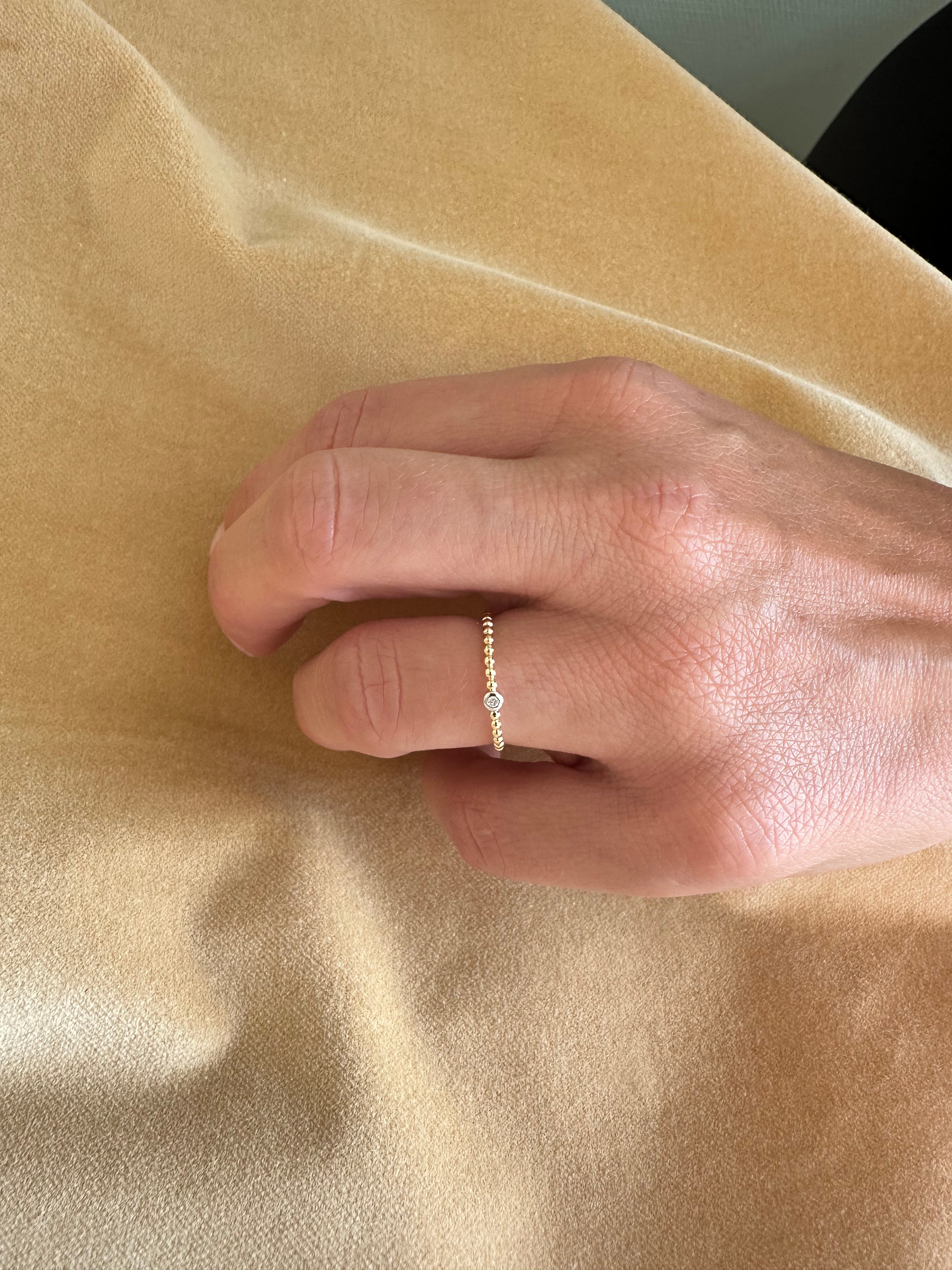 Kugelring aus 14 Karat Gold mit Diamant 0,02 ct