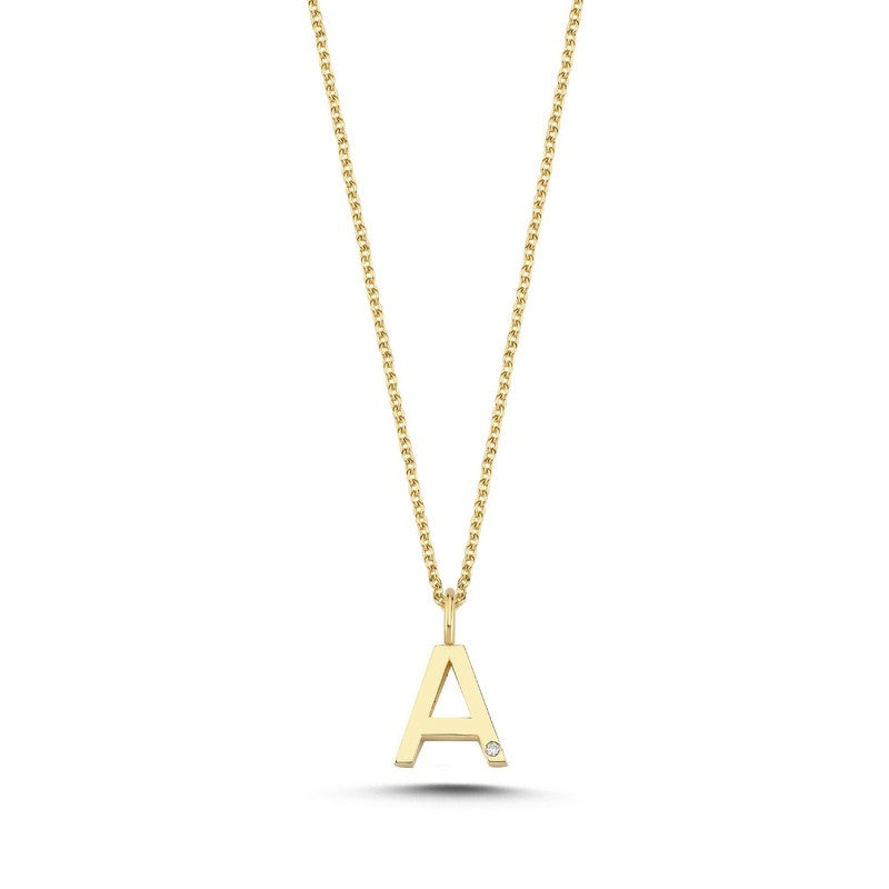 Buchstabenanhänger in 14 kt Gold mit 0,005 ct. 9,5 mm