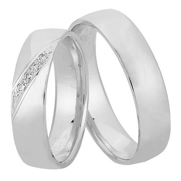 Nuran vielsesringe i 14 kt hvidguld med 4 brillanter i klassisk design