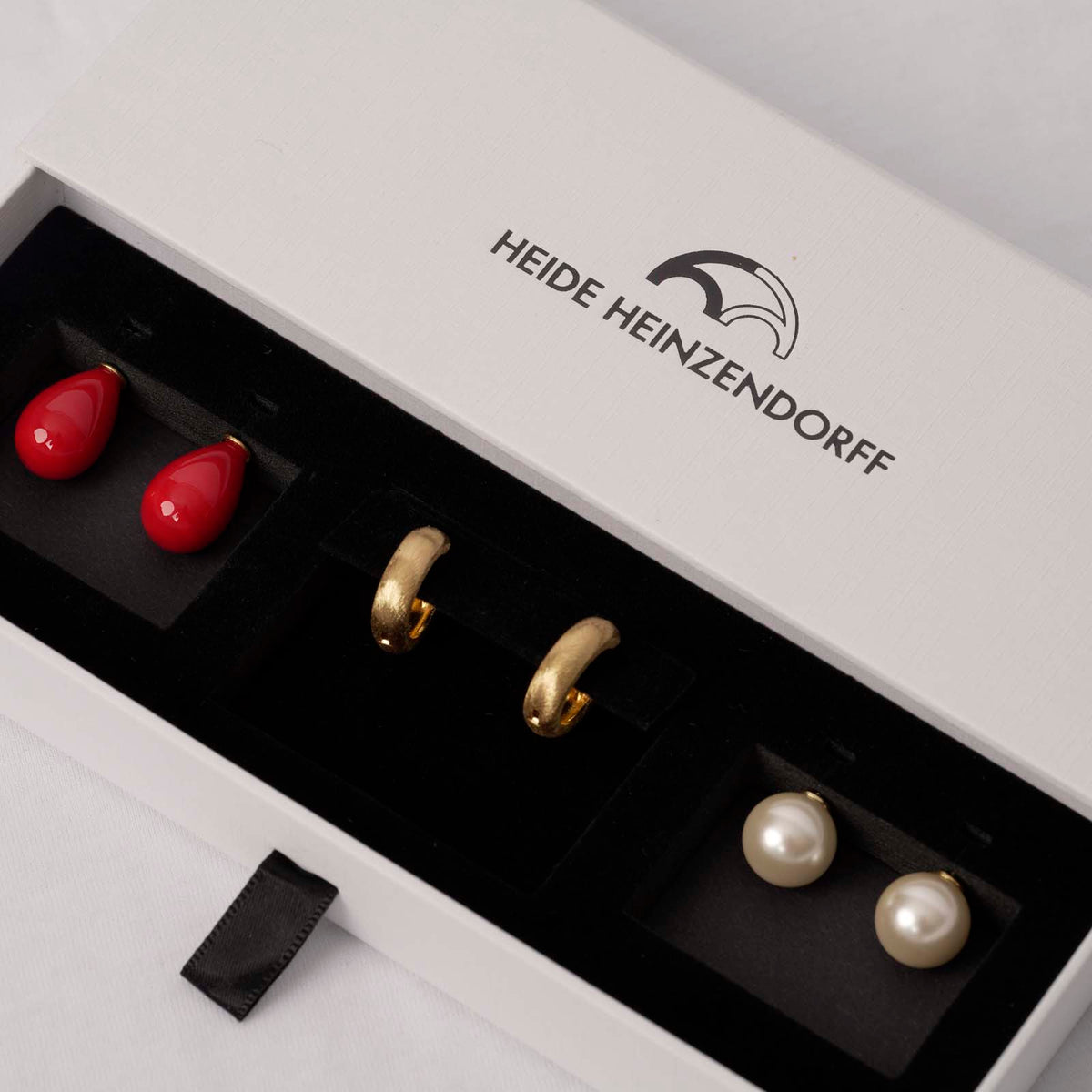 Elegante Heide Heinzendorff Stella-Creolen aus vergoldetem Silber mit Quarz und austauschbaren Anhängern – stilvoll, modern und vielseitig.