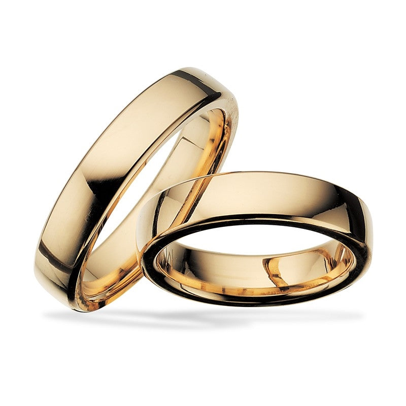 Scrouples vielsesringe i 8 eller 14 kt. rødguld med glat overflade og oval profil – klassisk design