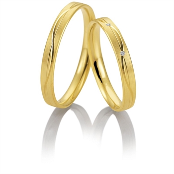 Eheringe in 9–14 kt Gold mit 0,22 ct im Labor gezüchteten Diamanten in Sternenstaub