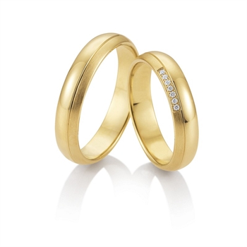 Eheringe in 9–14 kt Gold mit 0,22 ct im Labor gezüchteten Diamanten in Sternenstaub