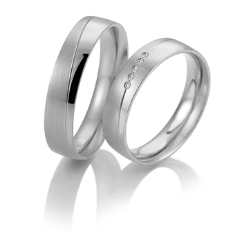Eheringe in 9–14 kt Gold mit 0,22 ct im Labor gezüchteten Diamanten in Sternenstaub