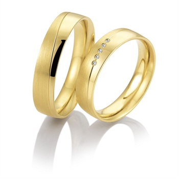 Eheringe in 9–14 kt Gold mit 0,22 ct im Labor gezüchteten Diamanten in Sternenstaub