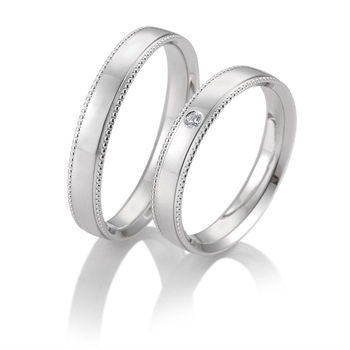 Eheringe in 9–14 kt Gold mit 0,22 ct im Labor gezüchteten Diamanten in Sternenstaub