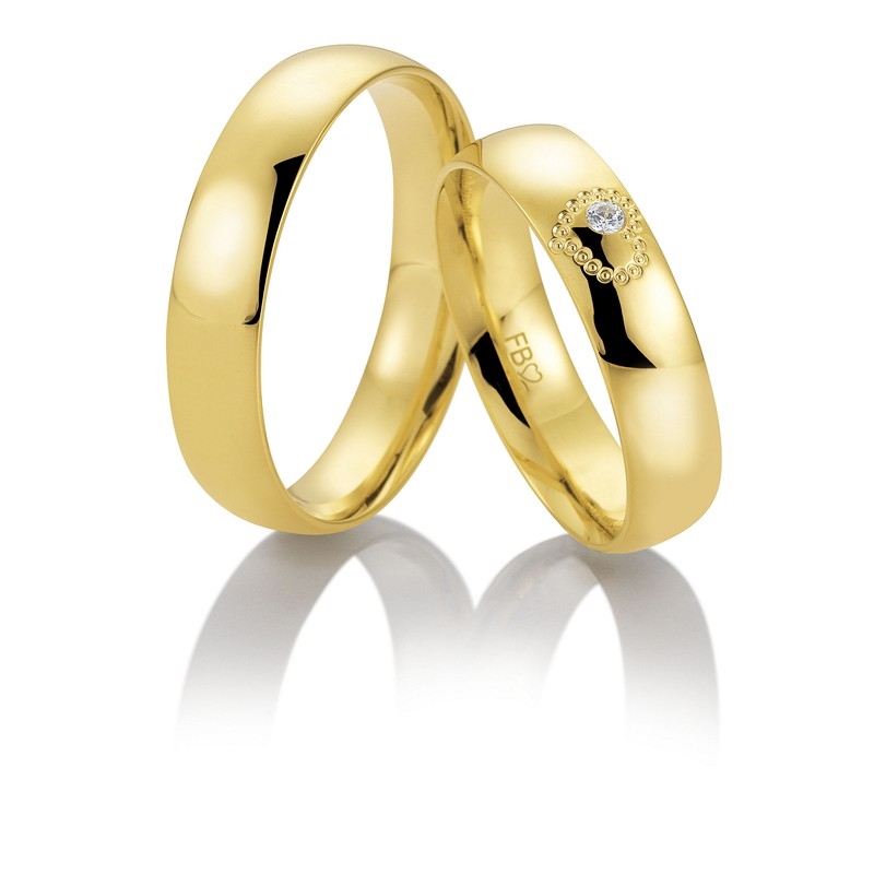 Breuning Trauringe in 8-14 kt Gold mit Herz und 0,025 ct Brillant in Damenring.
