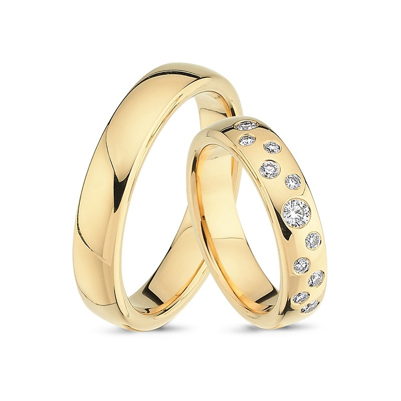 Nuran - Eheringe aus 14 kt Gold mit 5 Diamanten mit Brillantschliff von insgesamt 0,45ct